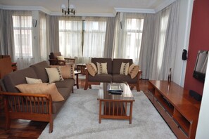 Executive Apartment, 1 Bedroom | 1 bedroom, premium bedding, in-room safe, individually furnished - GemSuites State House (Nairobi)