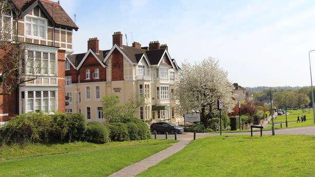 A hotel with a traditional architectural style, featuring a prominent entrance and multiple windows. - Russell Hotel (Royal Tunbridge Wells)