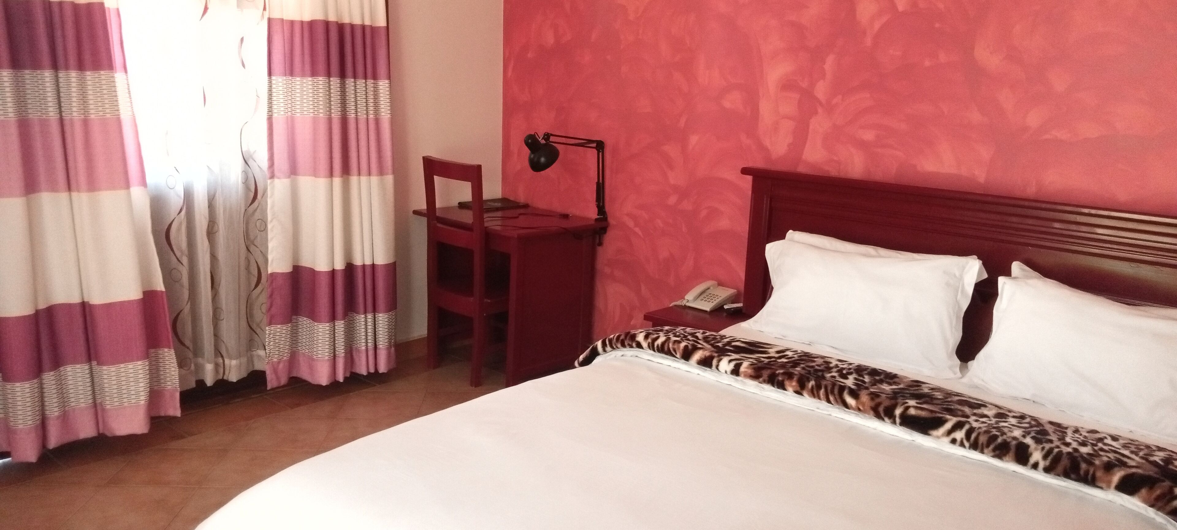 Minibar, desk, iron/ironing board, free cots/infant beds