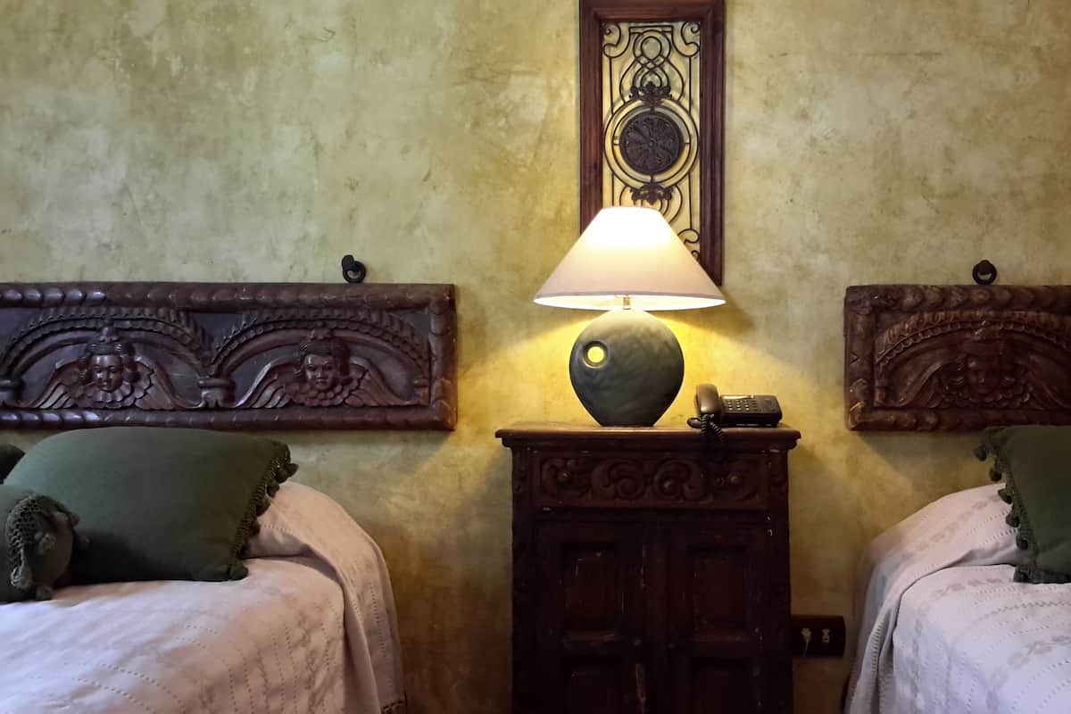 Standard Double Room, 1 Bedroom, Garden View | Down duvets, in-room safe, individually decorated