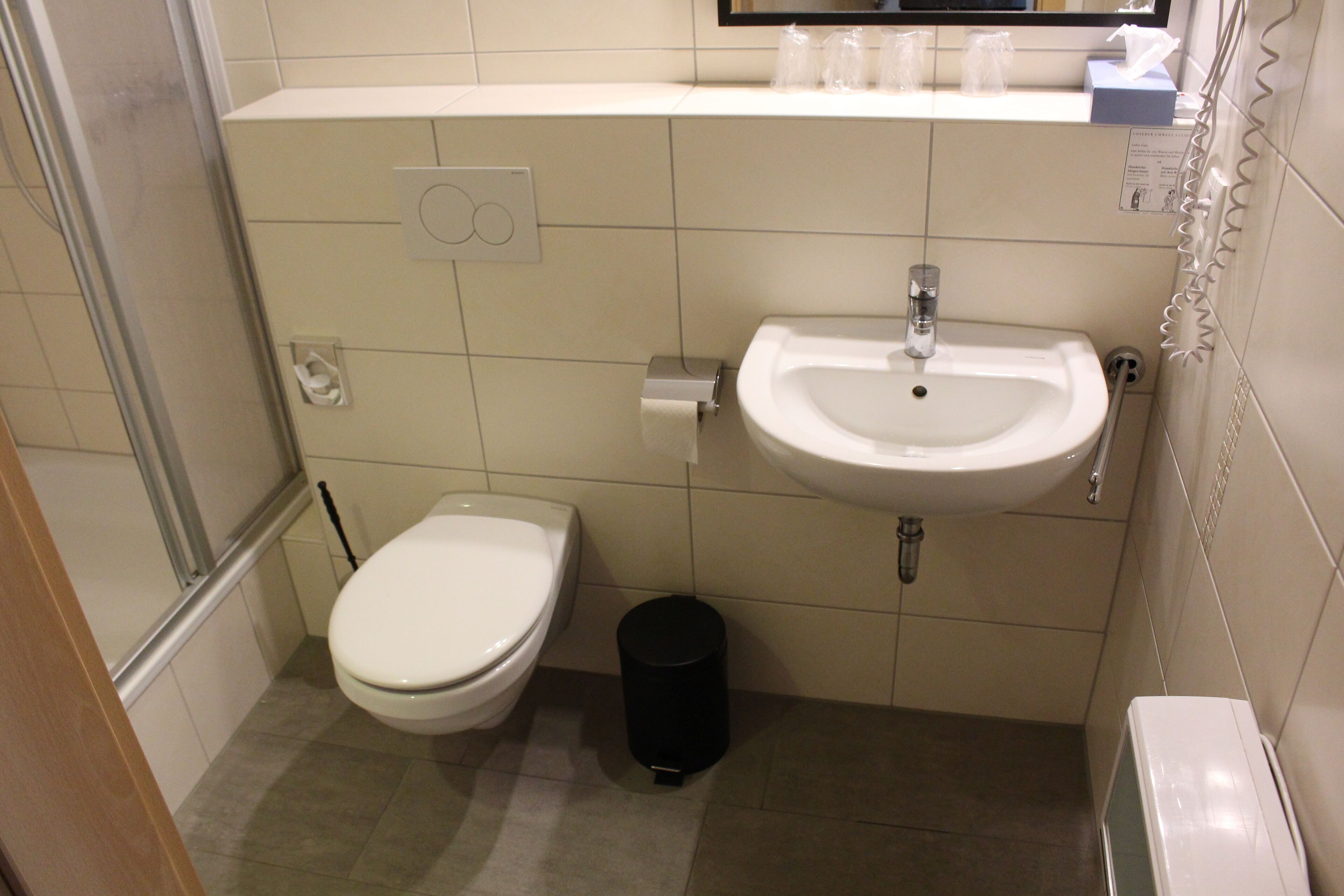 standard twin room | bathroom | shower, free toiletries, hair dryer, towels