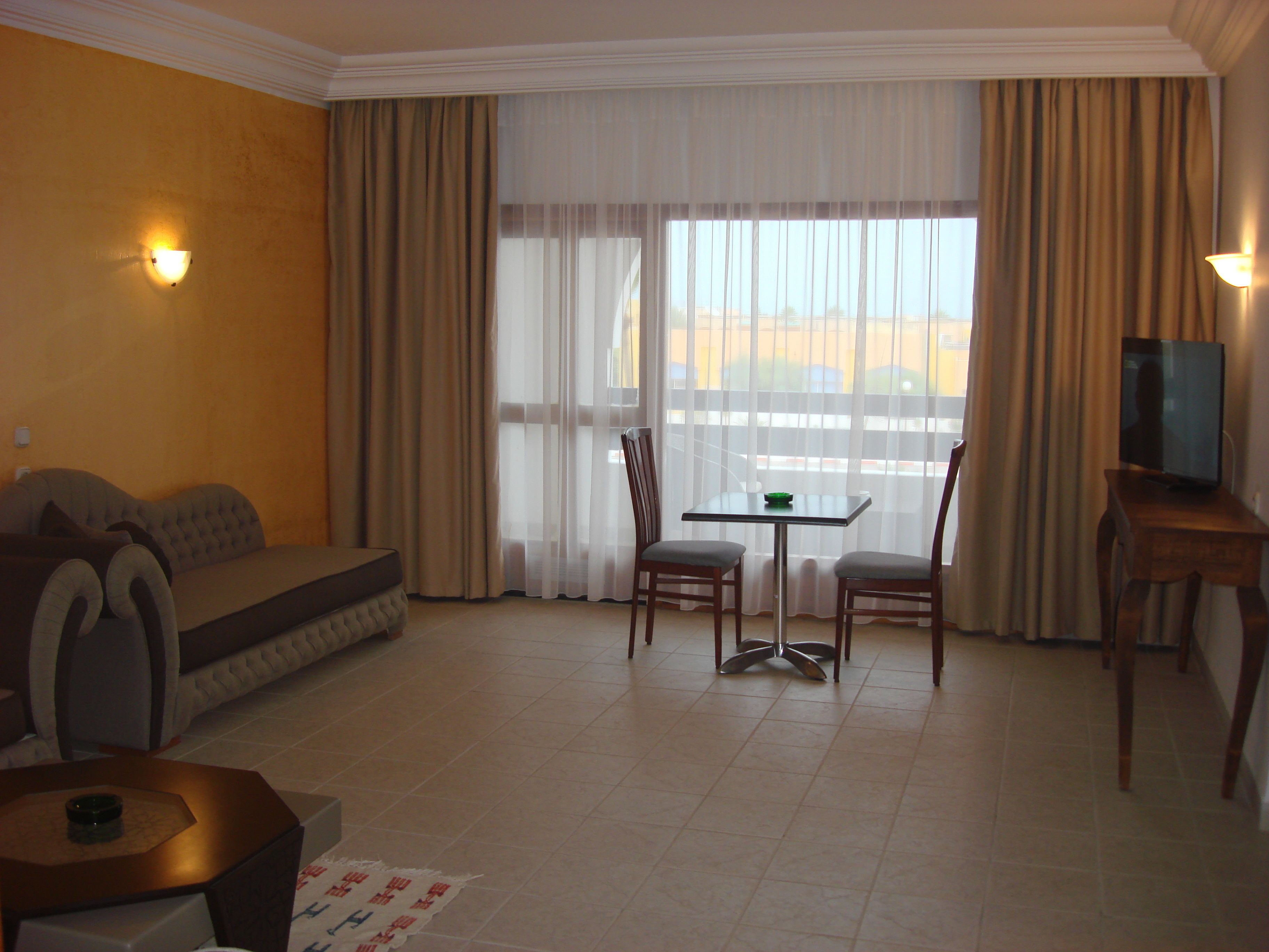 Habitación familiar, habitaciones conectadas | Área de sala de estar | Televisión de pantalla plana 