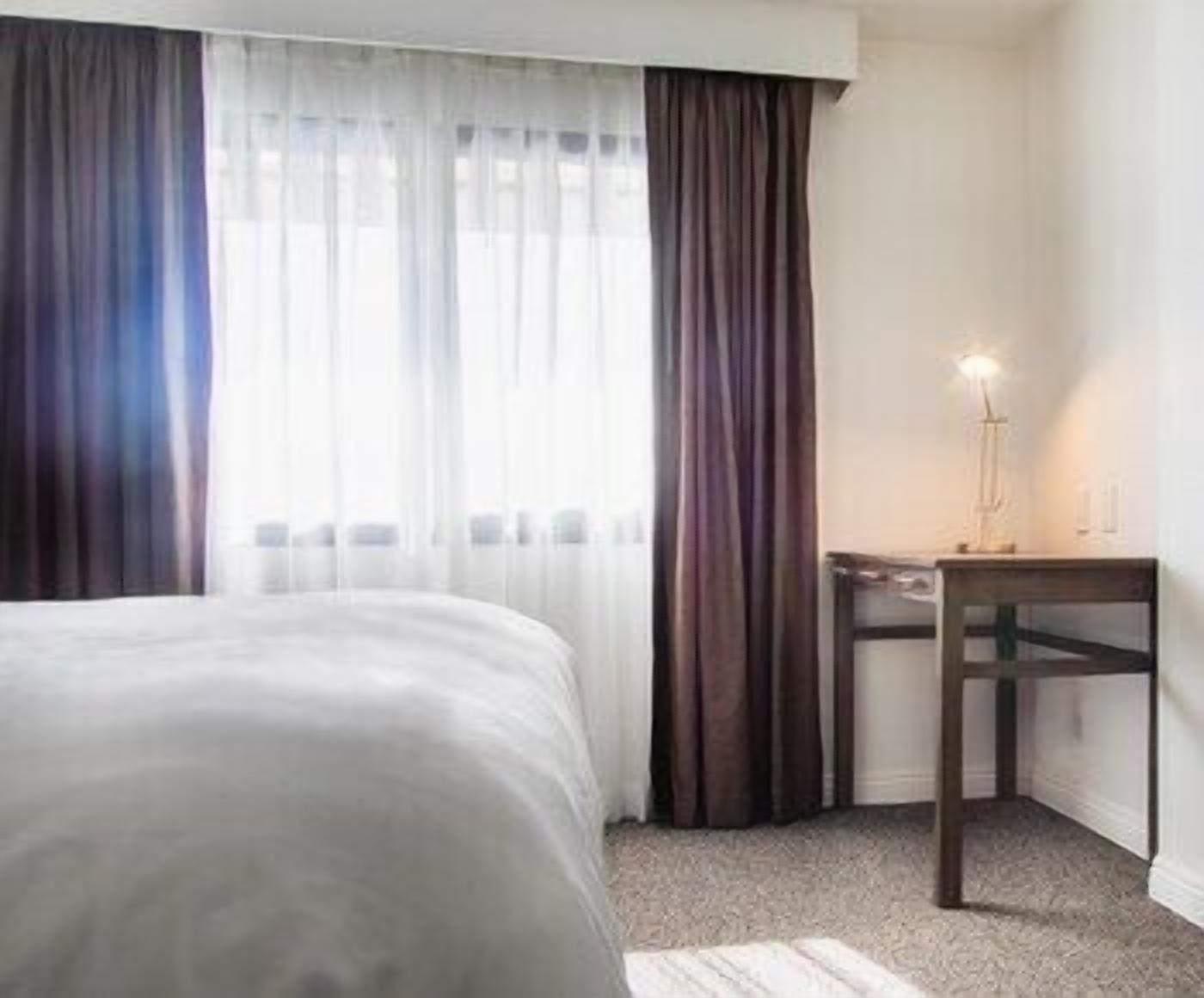 Pillowtop beds, desk, laptop workspace, free WiFi