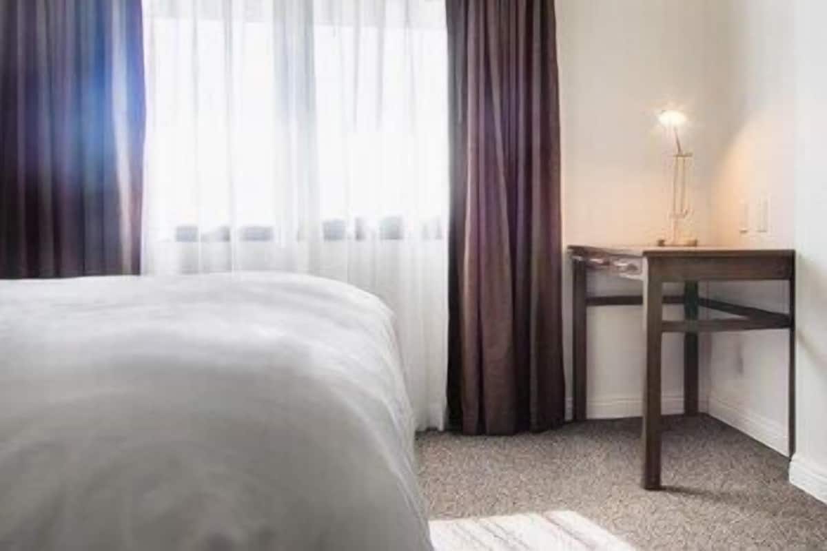 Pillowtop beds, desk, laptop workspace, free WiFi