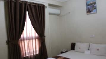 Standard Double Room | Desk, blackout drapes, iron/ironing board, free WiFi