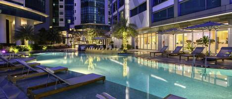 Outdoor pool, pool umbrellas, pool loungers