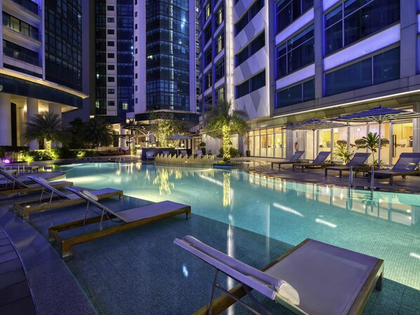 Outdoor pool, pool umbrellas, sun loungers