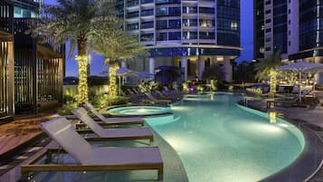 Outdoor pool, pool umbrellas, sun loungers