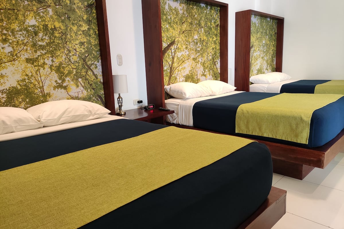 business triple room, 1 bedroom | 1 bedroom, premium bedding, in-room safe, iron/ironing board