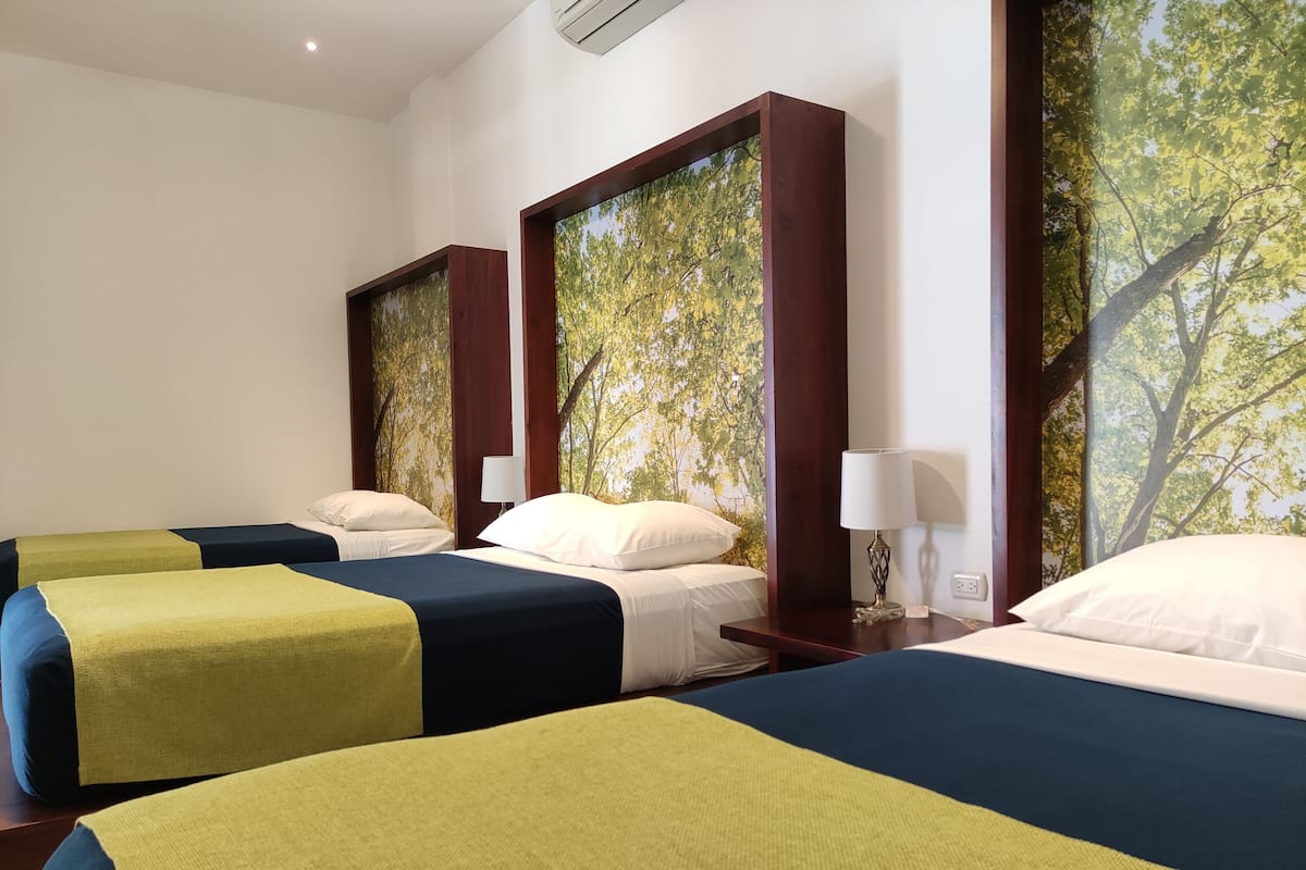 business triple room, 1 bedroom | 1 bedroom, premium bedding, in-room safe, iron/ironing board