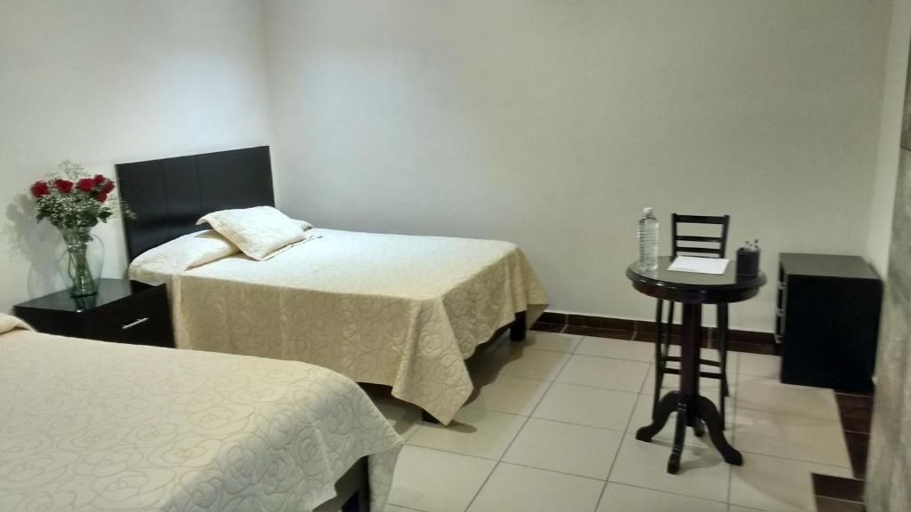 comfort double room, multiple beds, private bathroom | minibar, iron/ironing board, free wifi, bed sheets