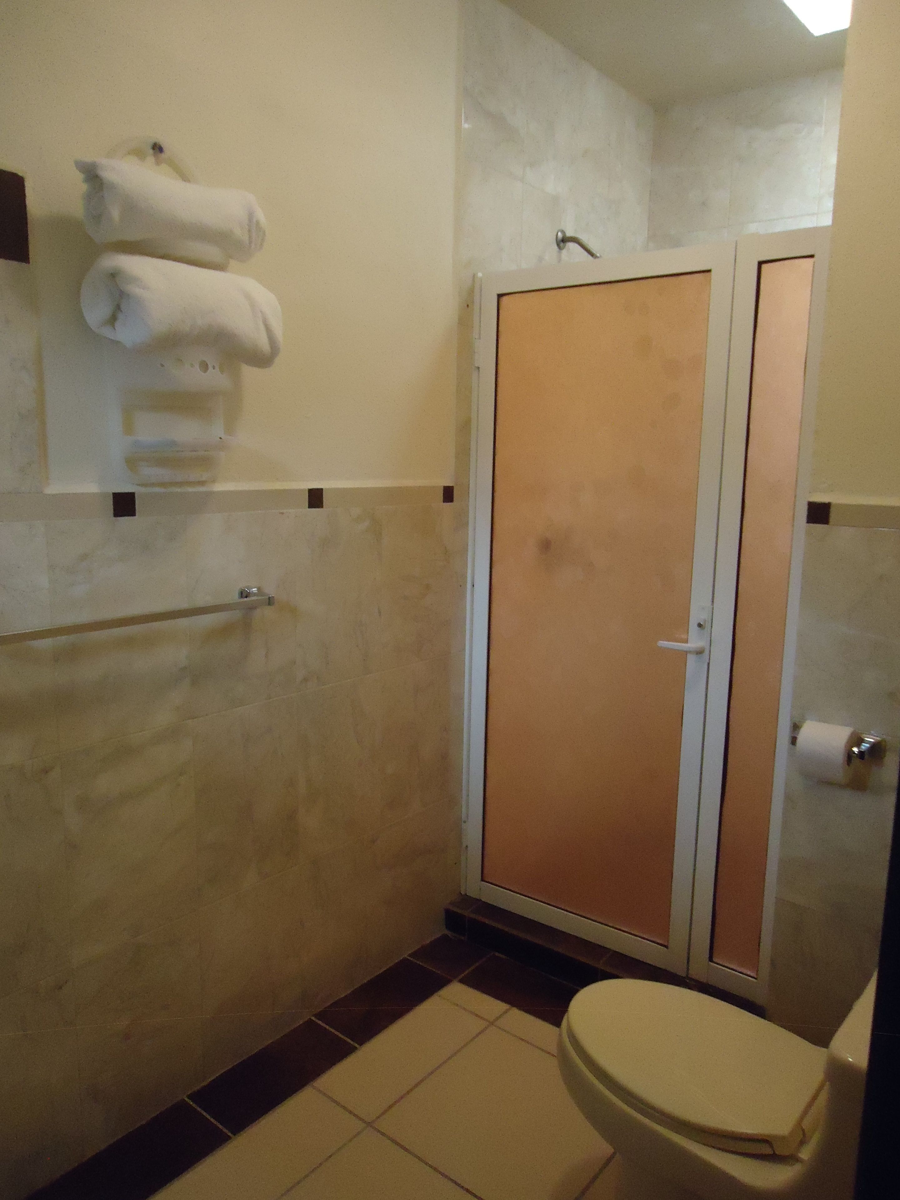 comfort double room, multiple beds, private bathroom | bathroom | shower, free toiletries, towels