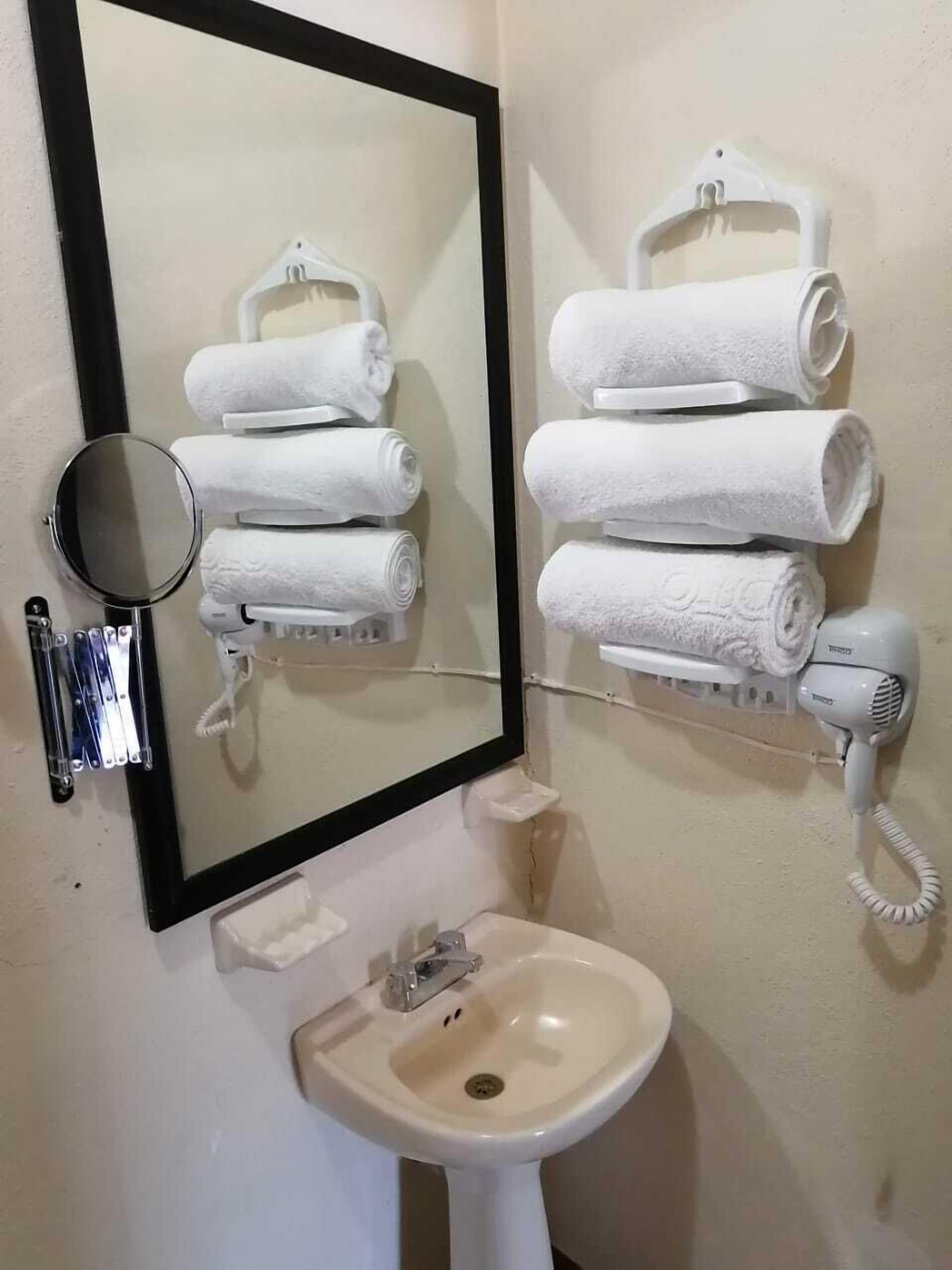 deluxe double room, 2 double beds, accessible, allergy friendly | bathroom | shower, free toiletries, towels