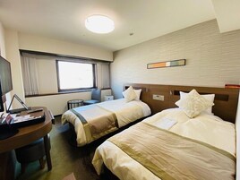 Economy Twin Room, Non Smoking | In-room safe, desk, iron/ironing board, free WiFi