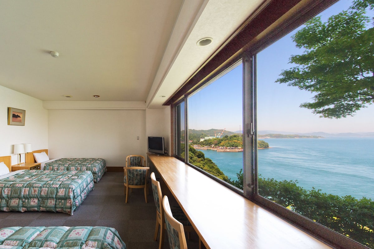 Quarto (4 Beds) | Wi-Fi de cortesia