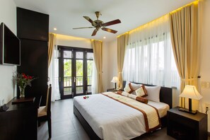 Deluxe Double or Twin Room, 1 Bedroom, Pool View | Minibar, in-room safe, desk, rollaway beds