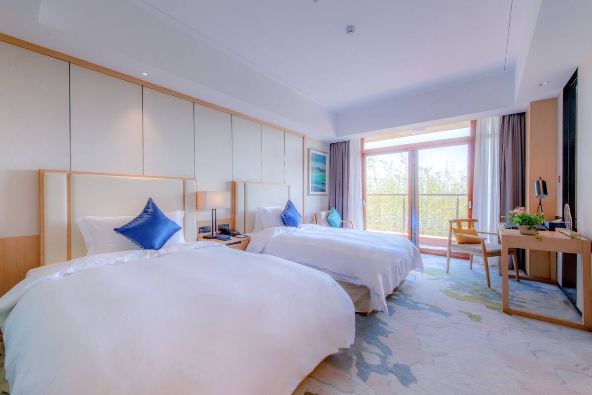 Standaard Twin kamer | Donsdekens, pillowtop-bedden, een minibar, een kluis op de kamer