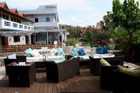 Terrace/patio. Naiades Almiros River Hotel