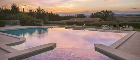 Seasonal outdoor pool, pool umbrellas, sun loungers