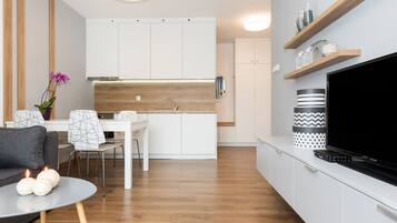 Apartment, 1 Bedroom | Living area | Flat-screen TV