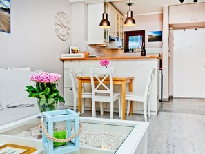 Apartment, 1 Bedroom (ul. Miedzymorze 10/28) | Living area | Flat-screen TV - BlueApart Miedzymorze Jurata (Jurata)