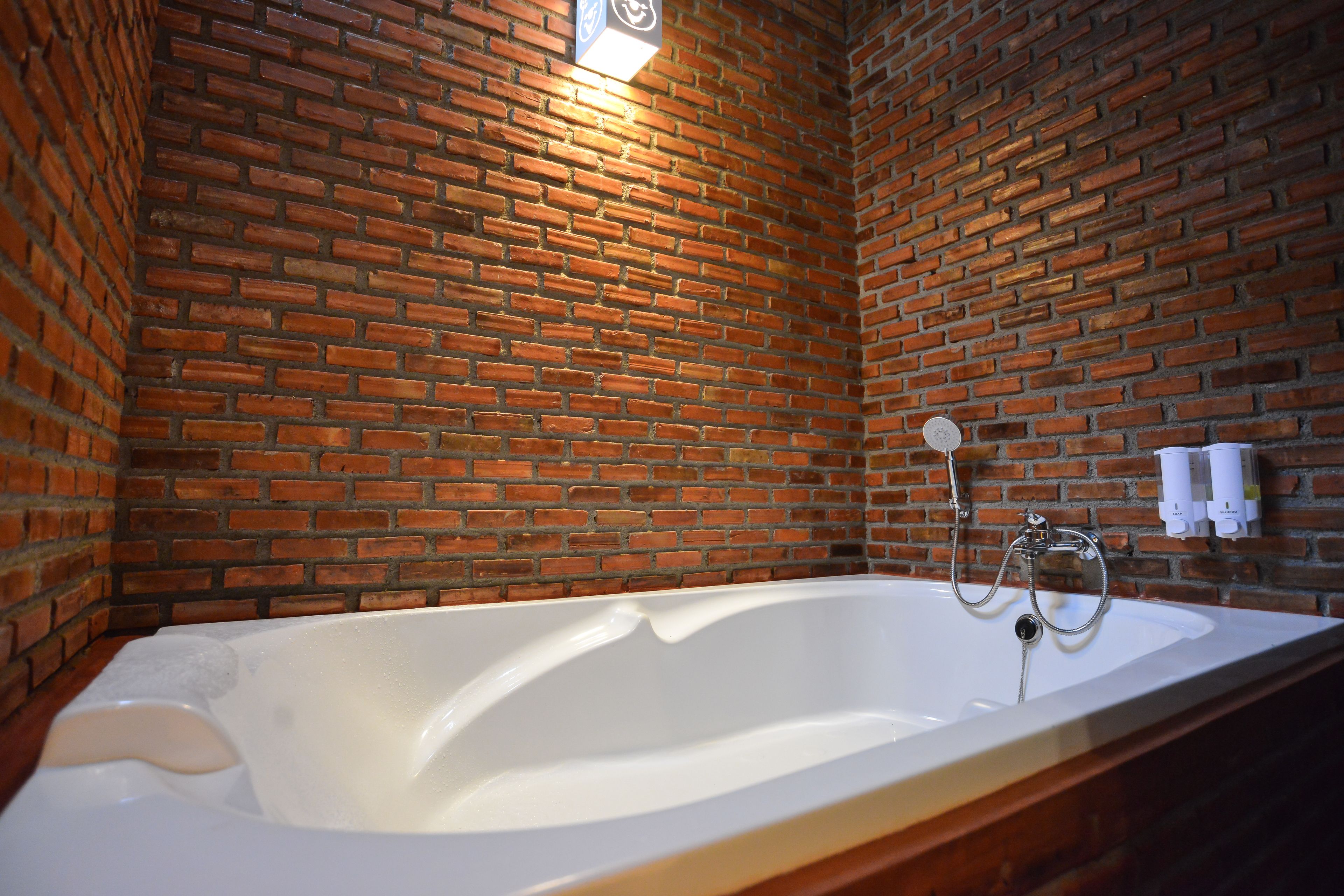 grand suite, 3 bedrooms, connecting rooms, river view | deep-soaking bathtub
