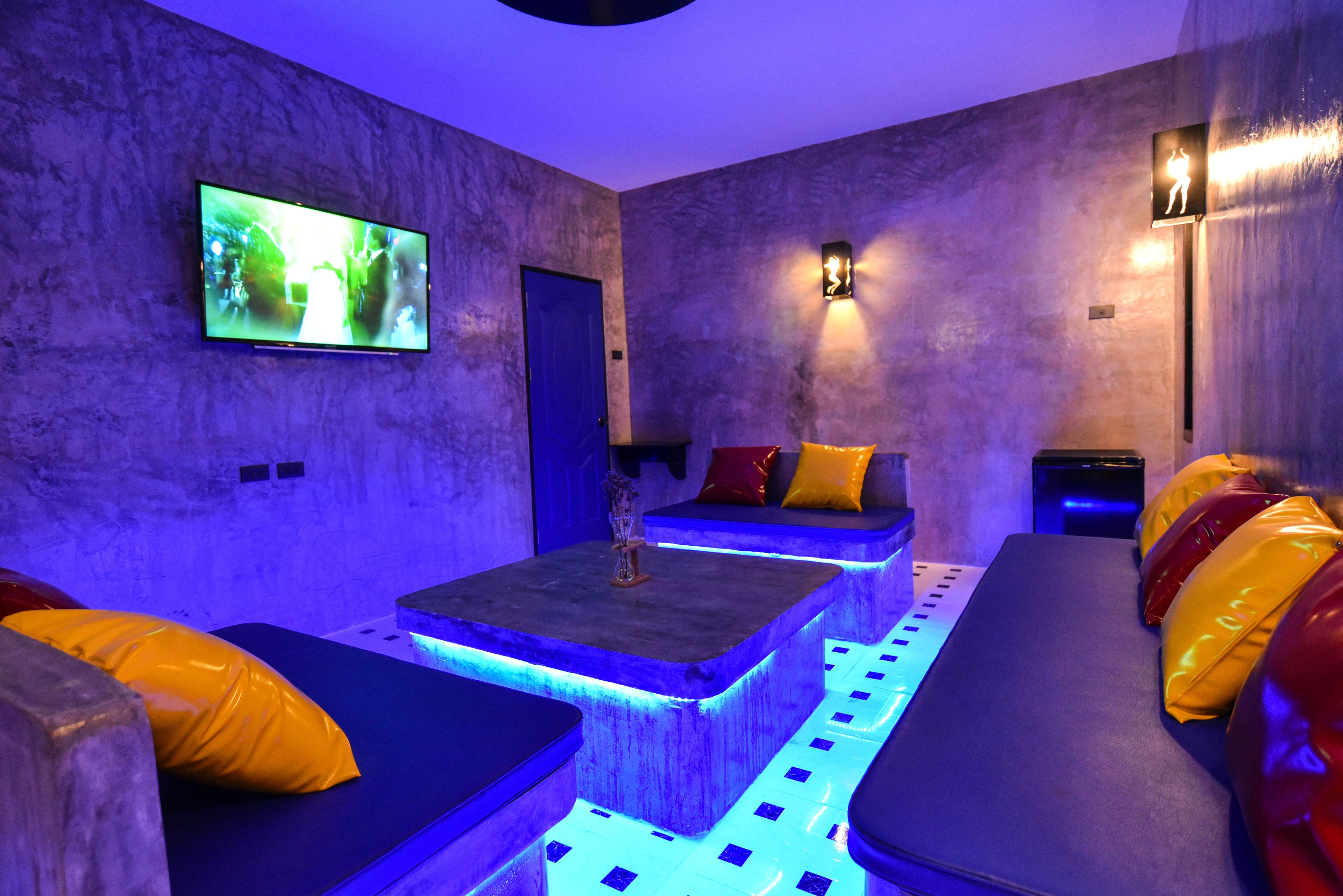 family quadruple room, 2 bedrooms, bathtub | living area | 42-inch flat-screen tv with digital channels, tv