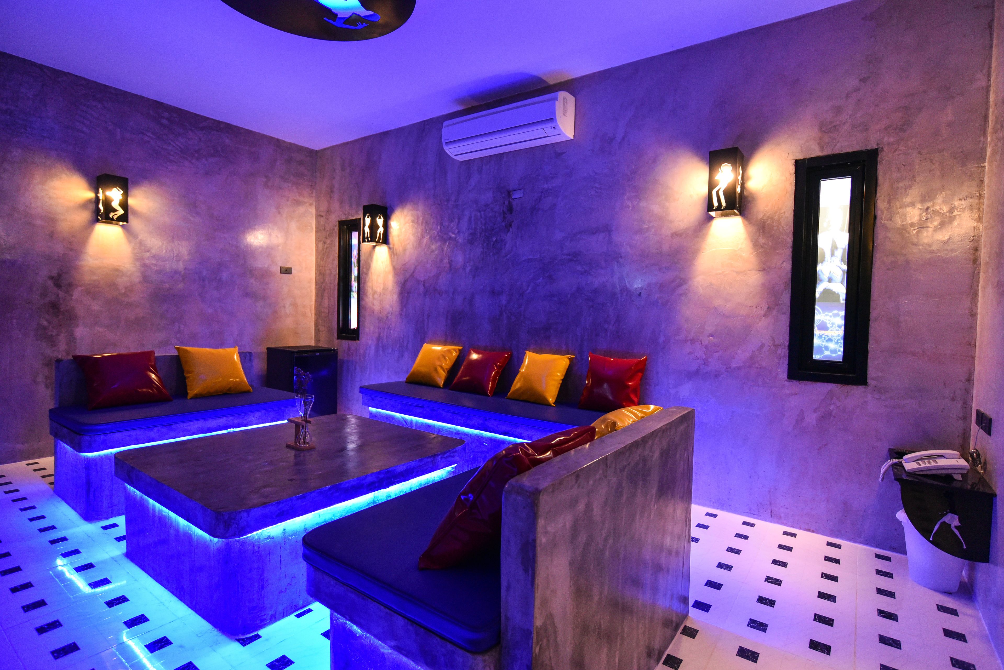 family quadruple room, 2 bedrooms, bathtub | living area | 42-inch flat-screen tv with digital channels, tv