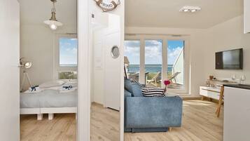 One-Bedroom Apartment with Sea View - 24/A19 Abrahama Street | Living area | Flat-screen TV