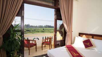 Quarto duplo família, 1 quarto, vista parcial para o mar | Roupas de cama premium, camas com colchões pillow-top, frigobar