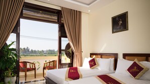 Family Twin Room, 1 Bedroom, Partial Sea View | Premium bedding, pillowtop beds, minibar, in-room safe - An Bang Beach Nature Homestay (Da Nang)