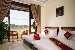 Family Twin Room, 1 Bedroom, Partial Sea View | Premium bedding, pillowtop beds, minibar, in-room safe