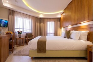 Ropa de cama de alta calidad, minibar, caja fuerte