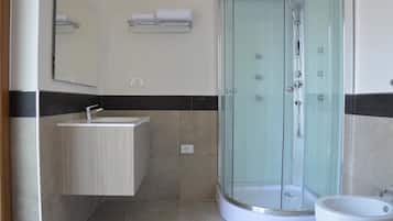Shower, free toiletries, hair dryer, bidet