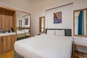 Ropa de cama de alta calidad y minibar 