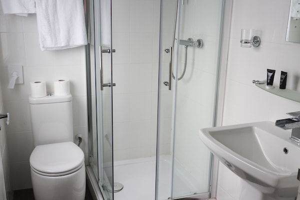 Shower, free toiletries, hair dryer, towels