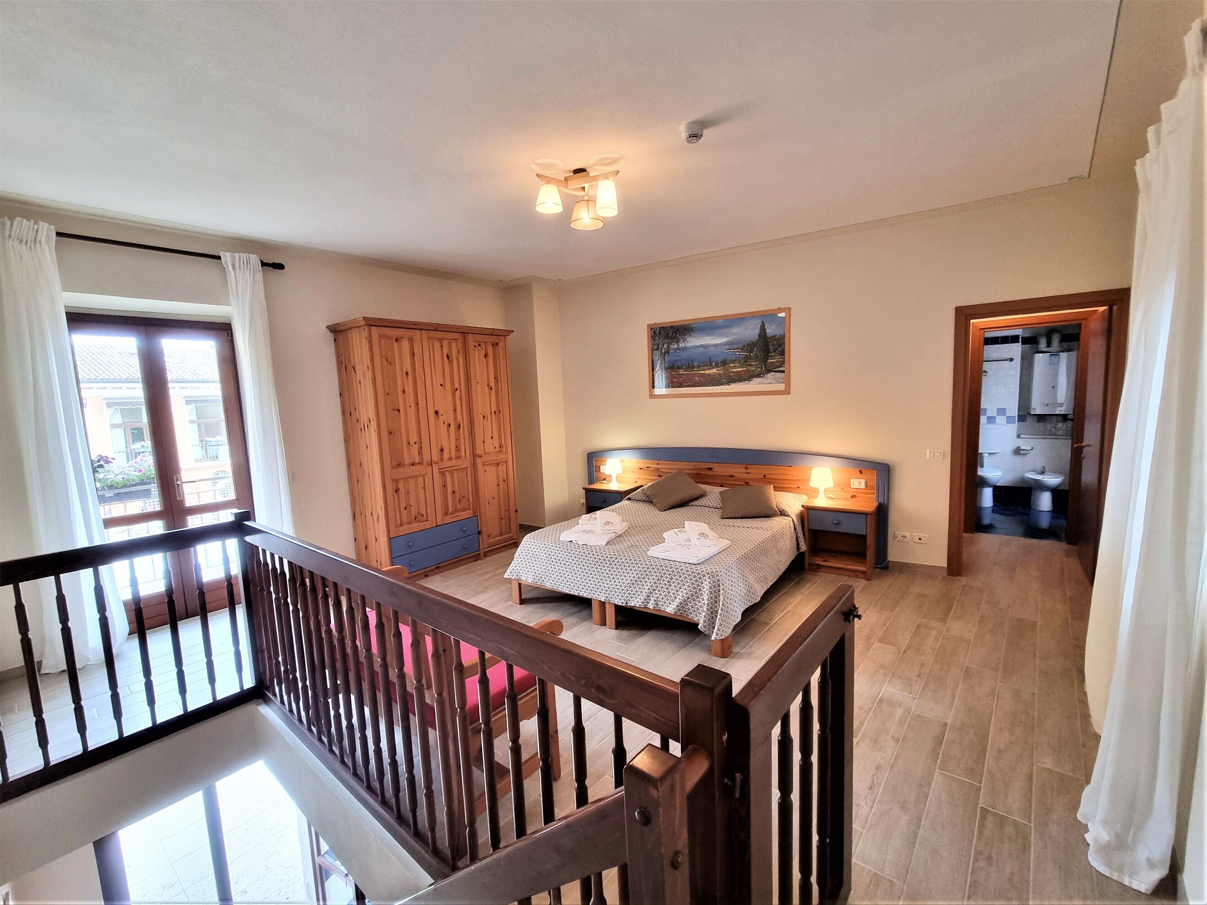 Trilocale Superior | Zimmersafe, kostenloses WLAN, Bettwäsche