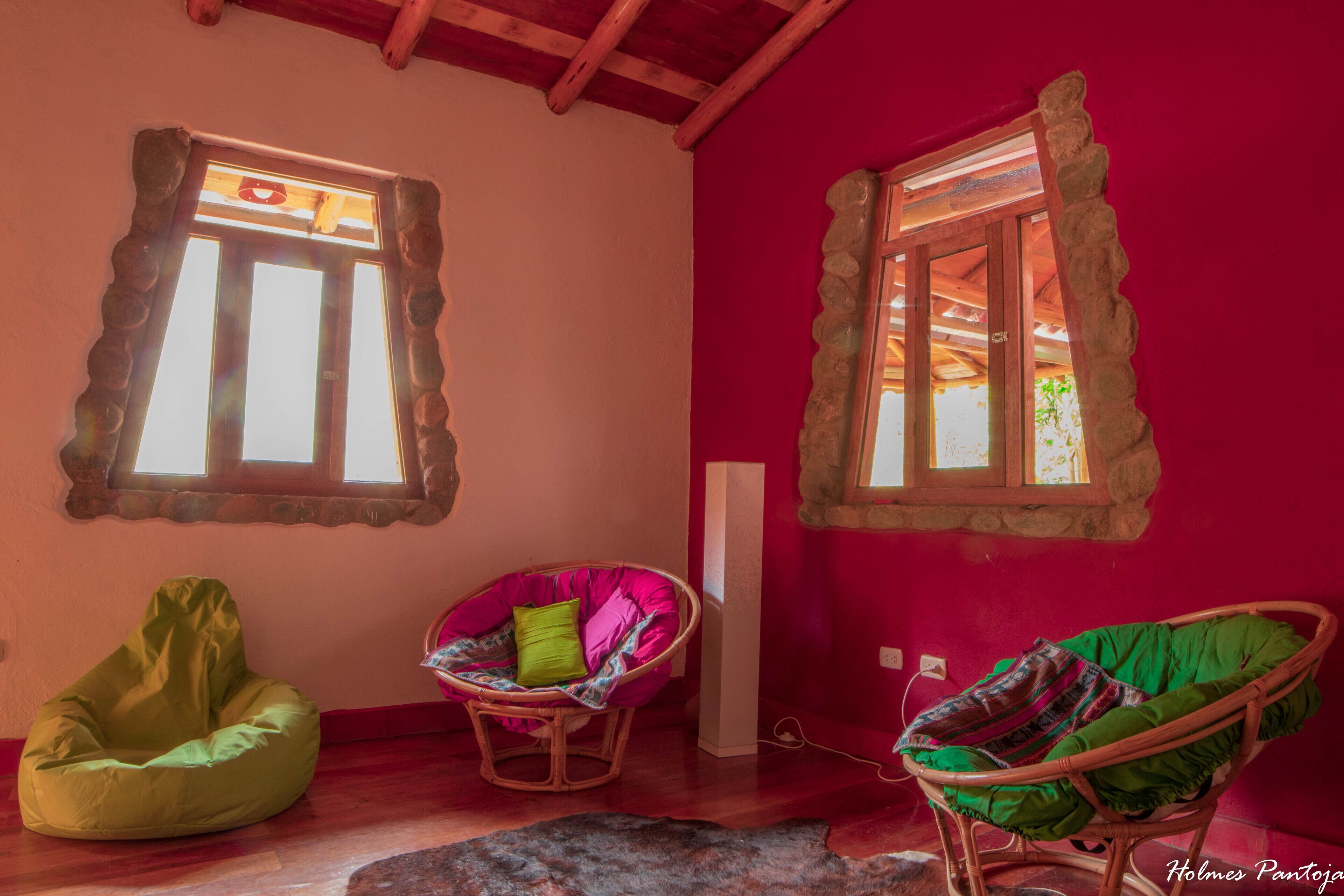 deluxe double room, mountain view | living area | table football, books