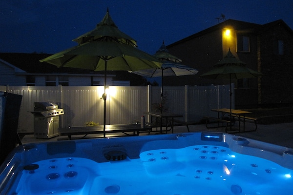 Family Condo, 4 Bedrooms | Outdoor spa tub