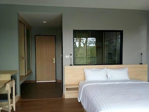 Desk, blackout drapes, free WiFi - Riverawan Hotel - SHA Extra Plus (Chanthaburi)