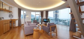 Deluxe Sea View Duplex Suite | Living room | 30-inch LCD TV with cable channels, TV, pay movies - ShenZhen DaMeiSha Airland Hotel (Shenzhen)