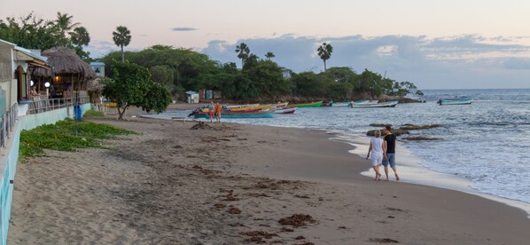 Na praia, areia branca 