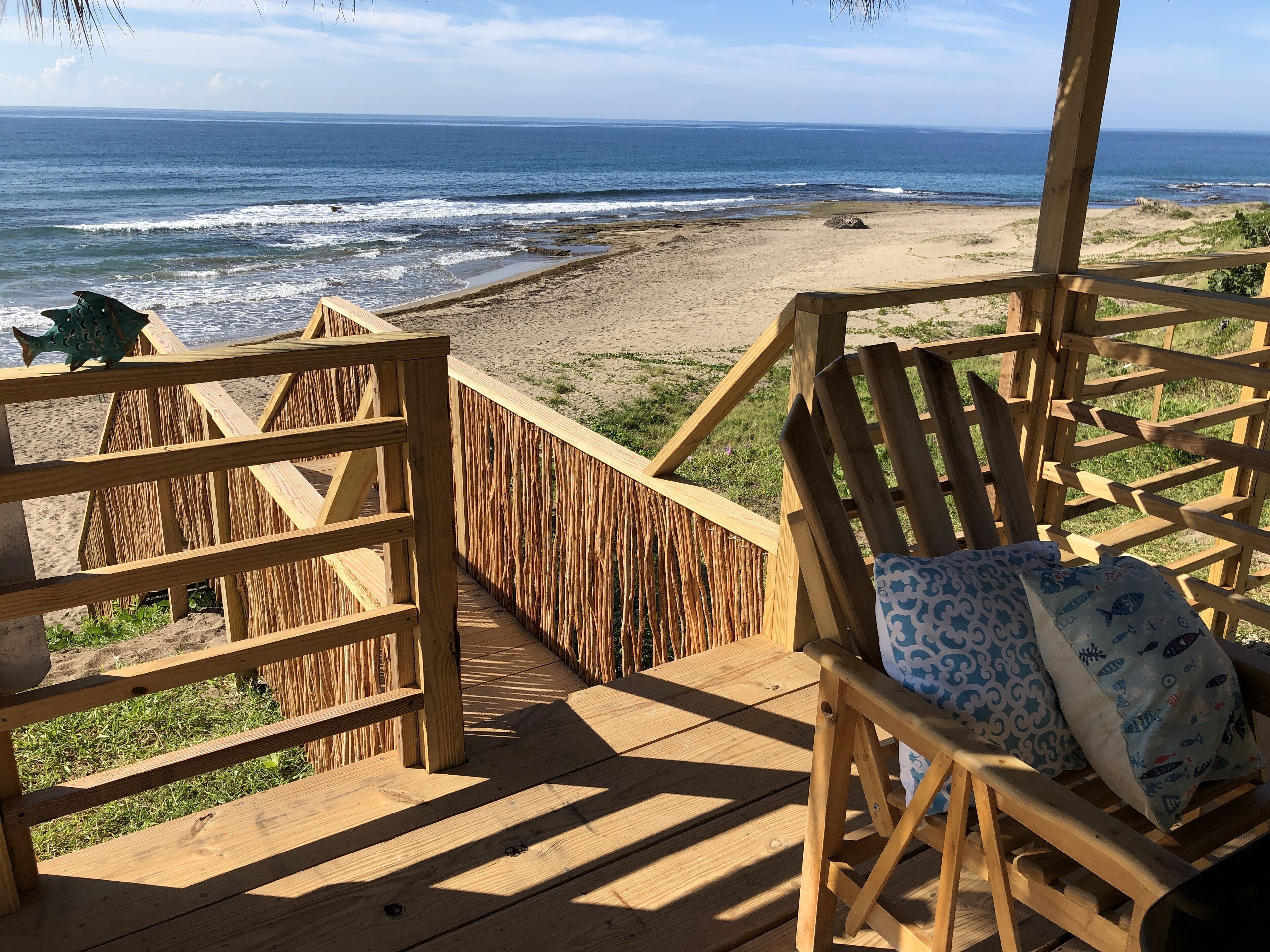 On the beach, sun-loungers, beach towels, beach yoga