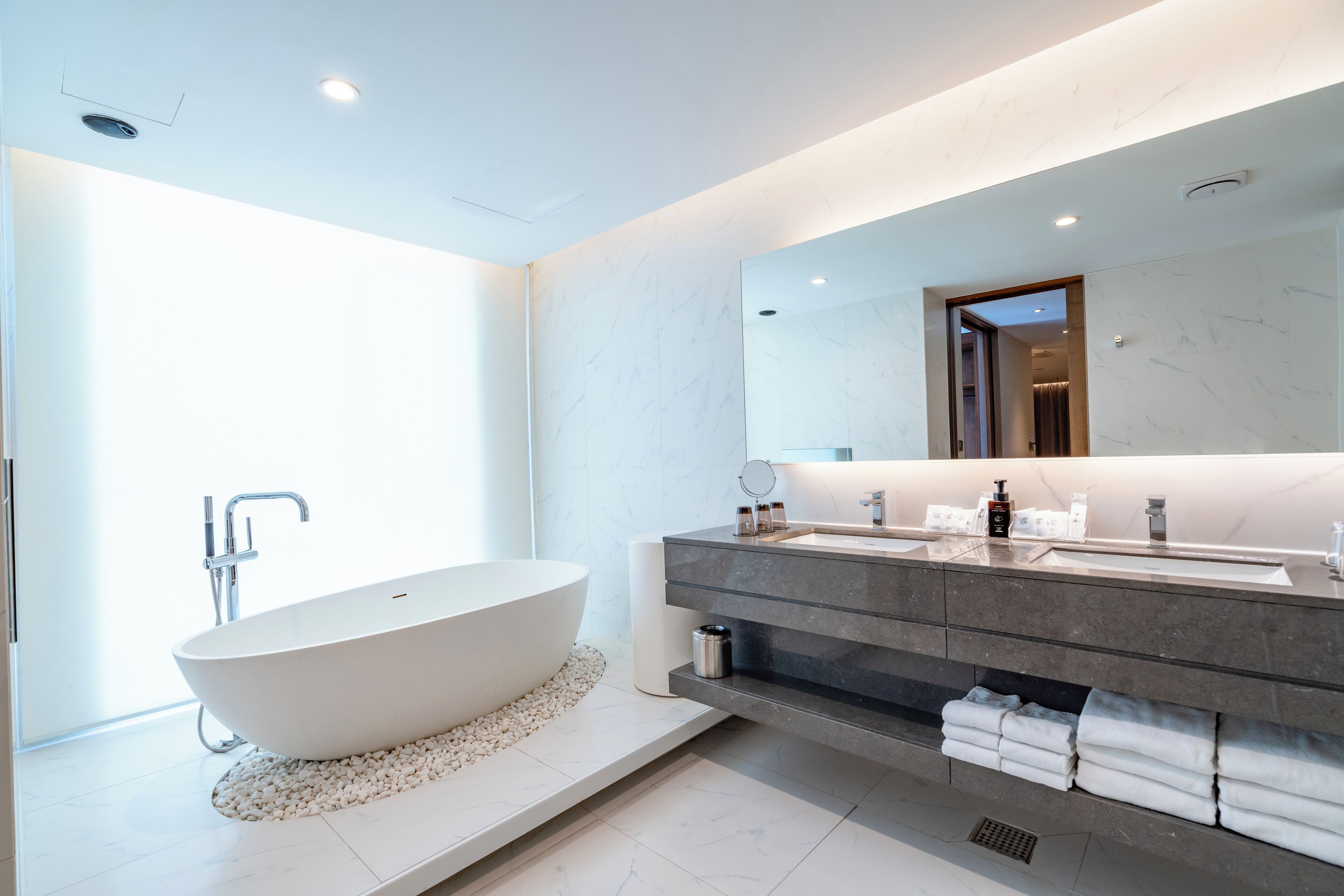 family suite | bathroom | shower, hair dryer, bathrobes, slippers