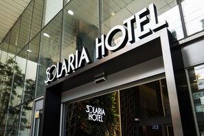 The exterior of the Solaria Hotel with a prominent sign and large windows. - SOLARIA NISHITETSU HOTEL Busan (Busan)