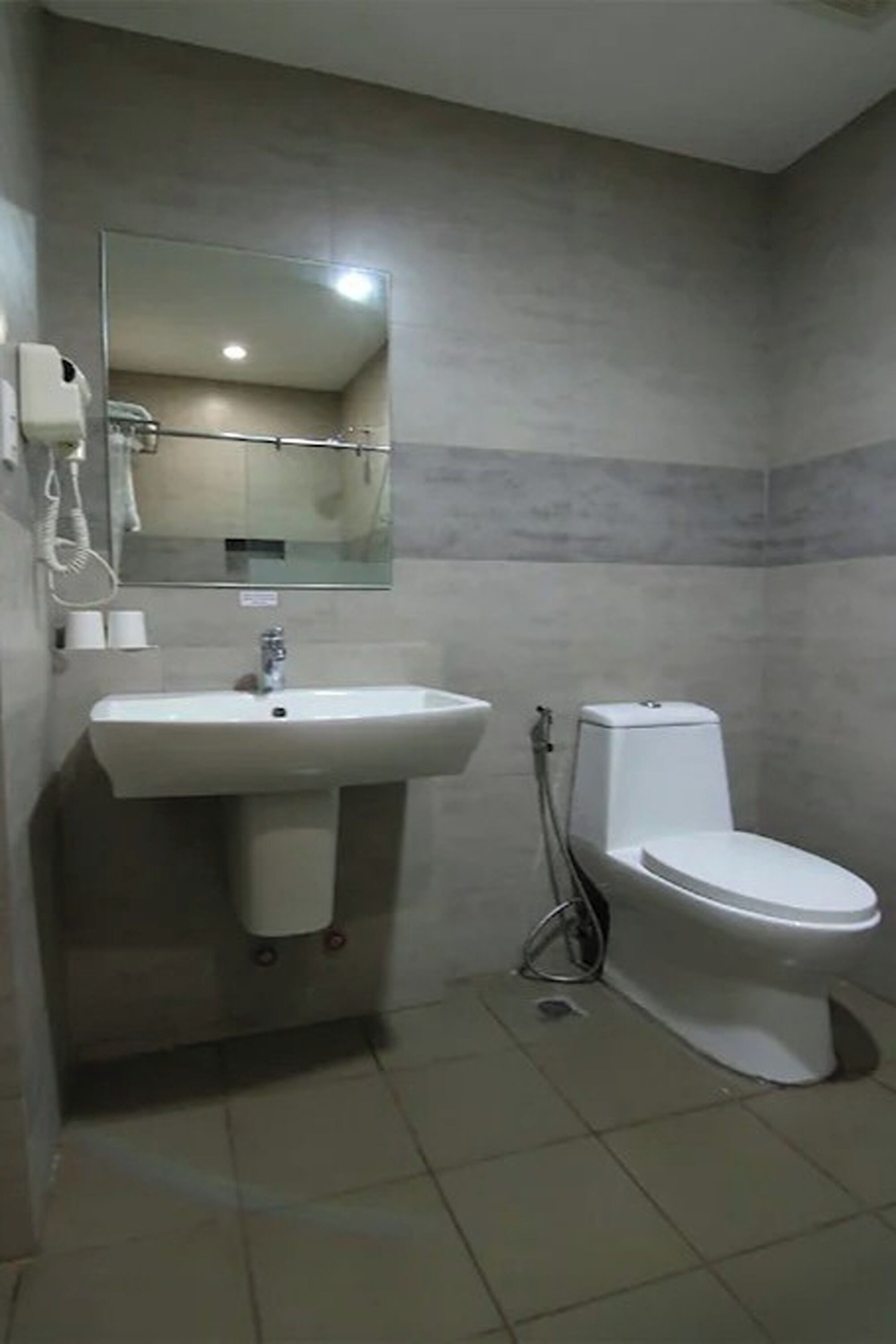 deluxe room | bathroom | shower, free toiletries, hair dryer, slippers