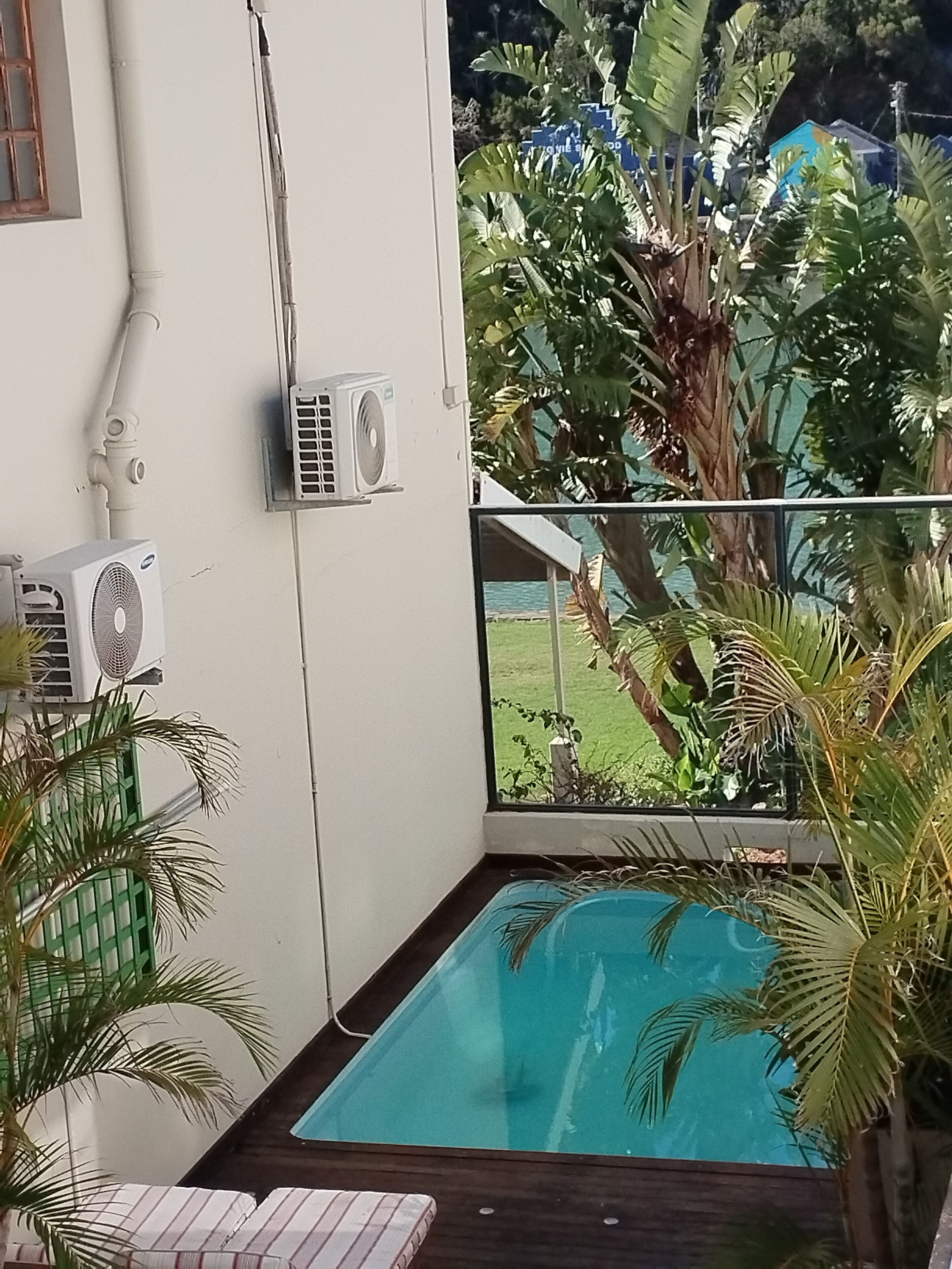 outdoor pool, pool loungers