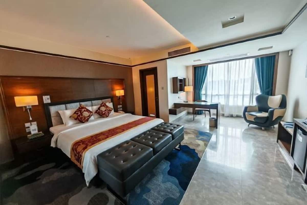 Coffres-forts dans les chambres, bureau, fer et planche à repasser