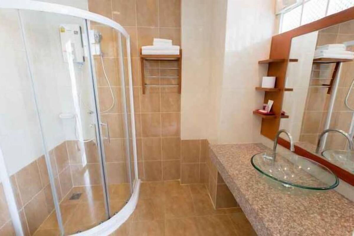 Bathroom | Shower, free toiletries, hair dryer, towels