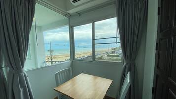 Deluxe Sea View With Balcony | Living area | Flat-screen TV